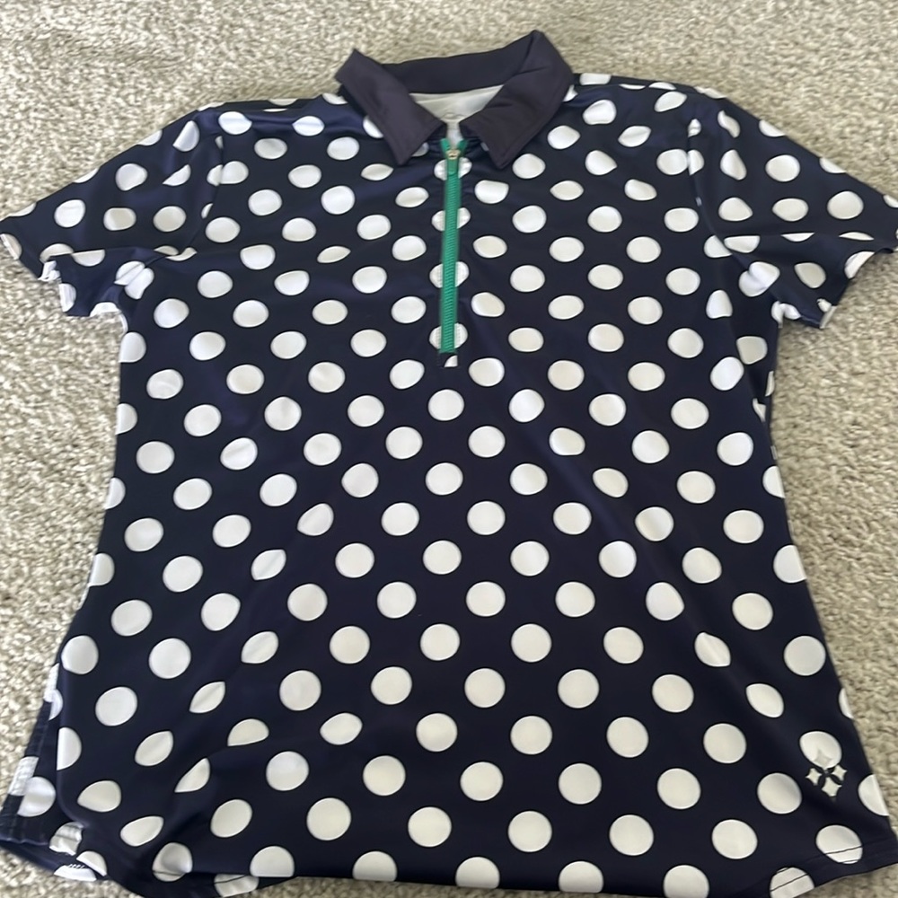 Navy and white polka dot golf shirt